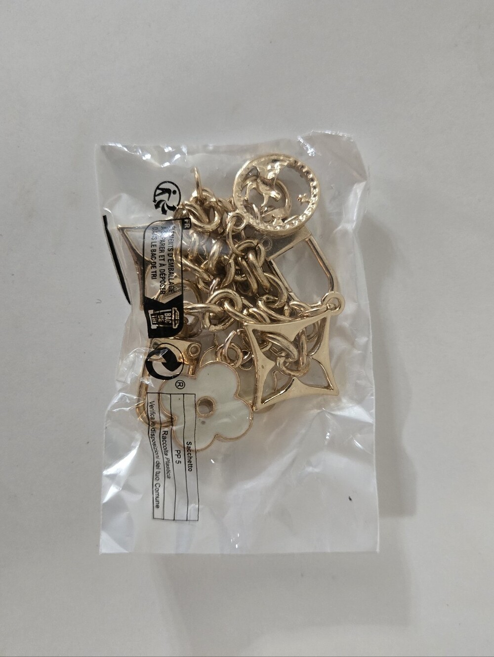 Gold Tone Charm Bracelet with Horse, Flower & Geometric Charms – New